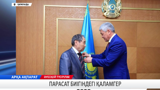 Парасат биігіндегі қаламгер 
